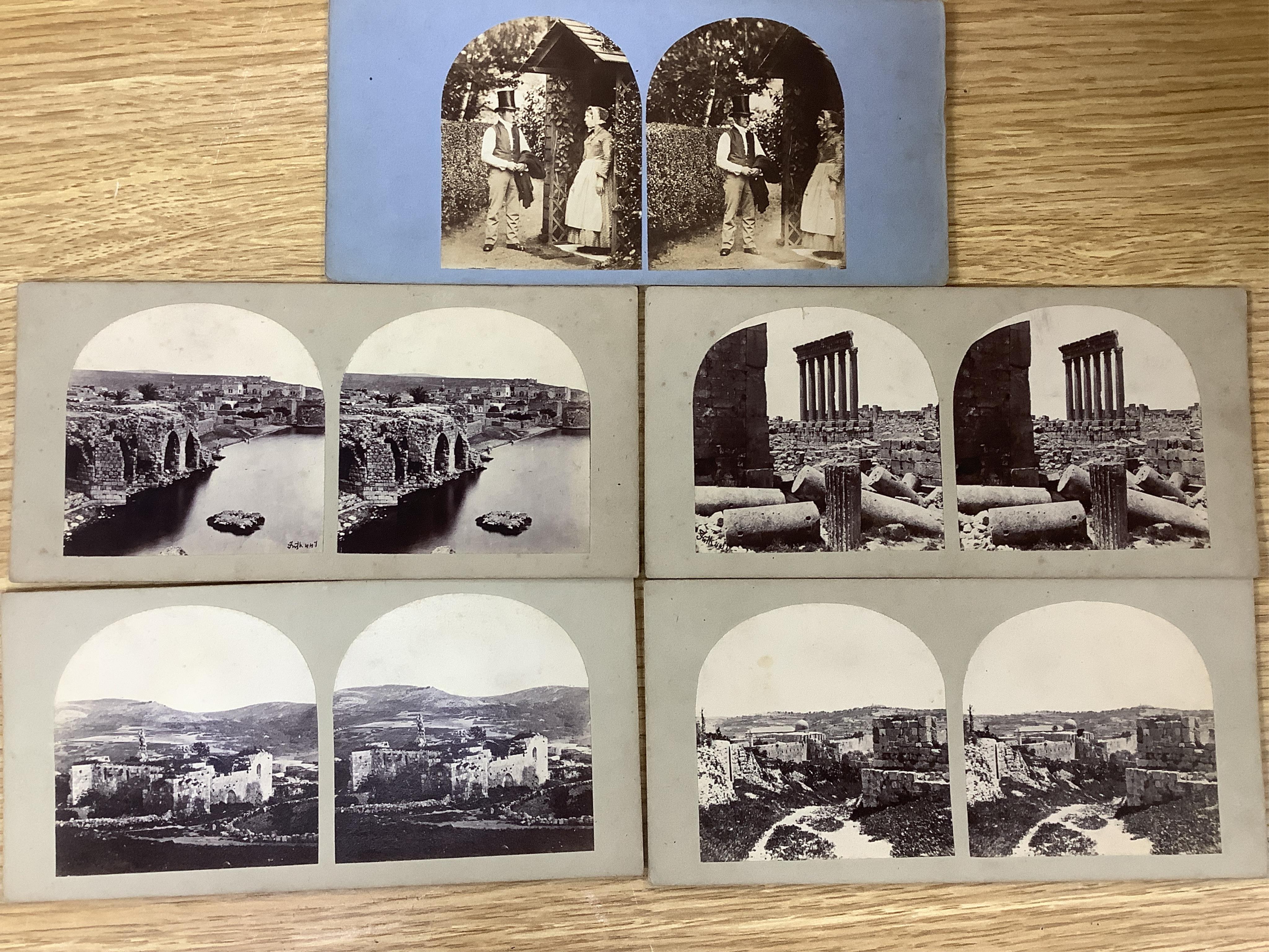 A late 19th century cased stereoscopic viewer together with topographical and other cards. Condition - fair